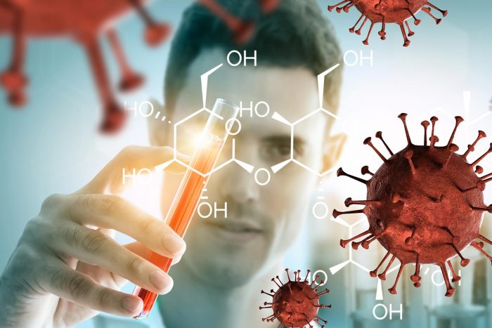 investigador con ensayos contra el covid-19